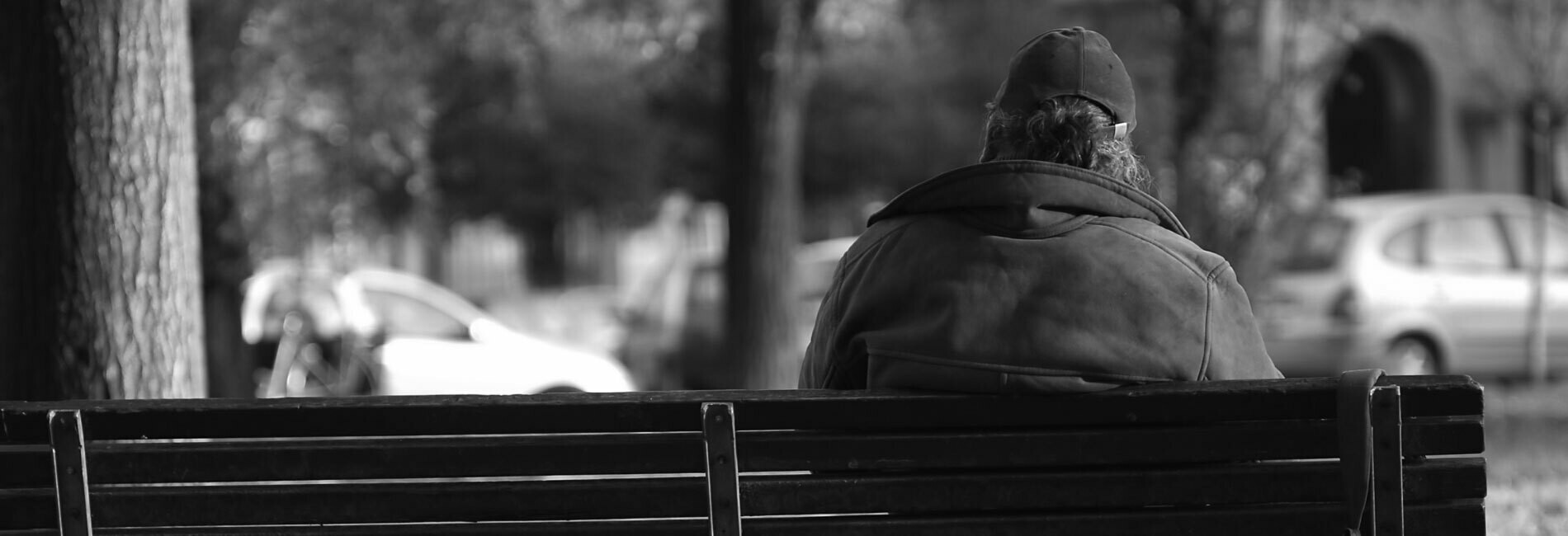 Homeless Person on Park Bench