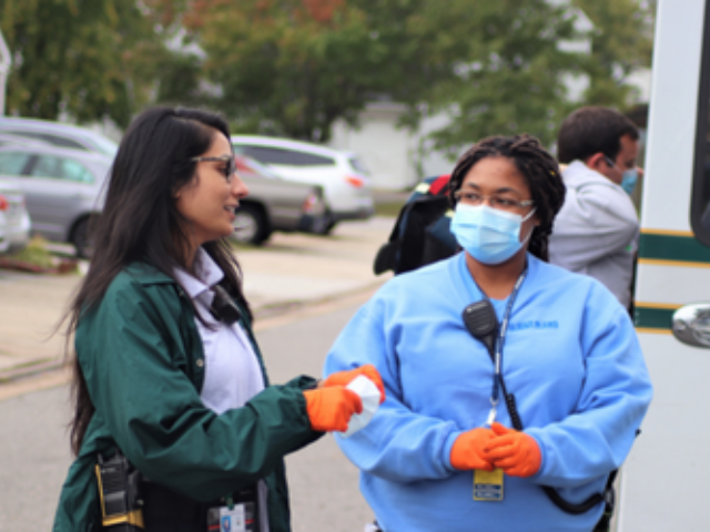 Paramedic Talking to Doctor