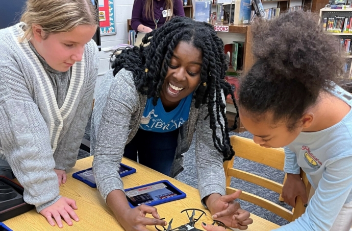 Children playing with drone
