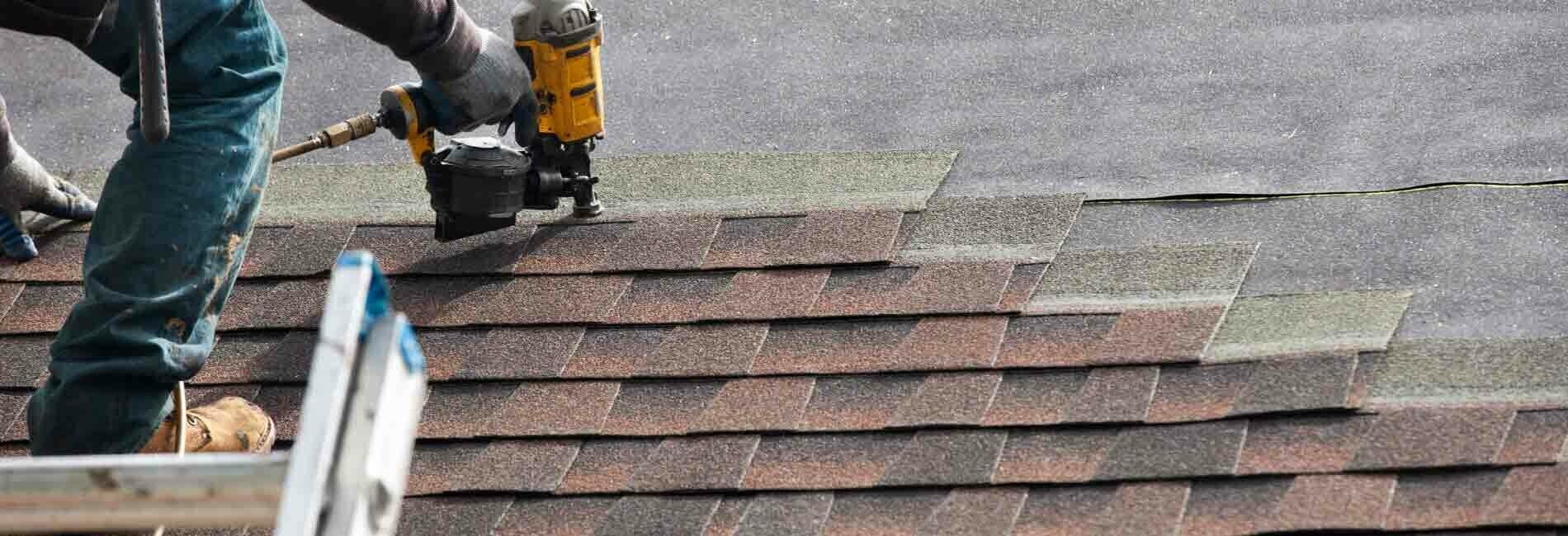 Roofer Installing Shingles